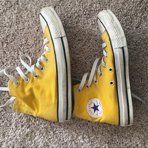 Yellow high top converse